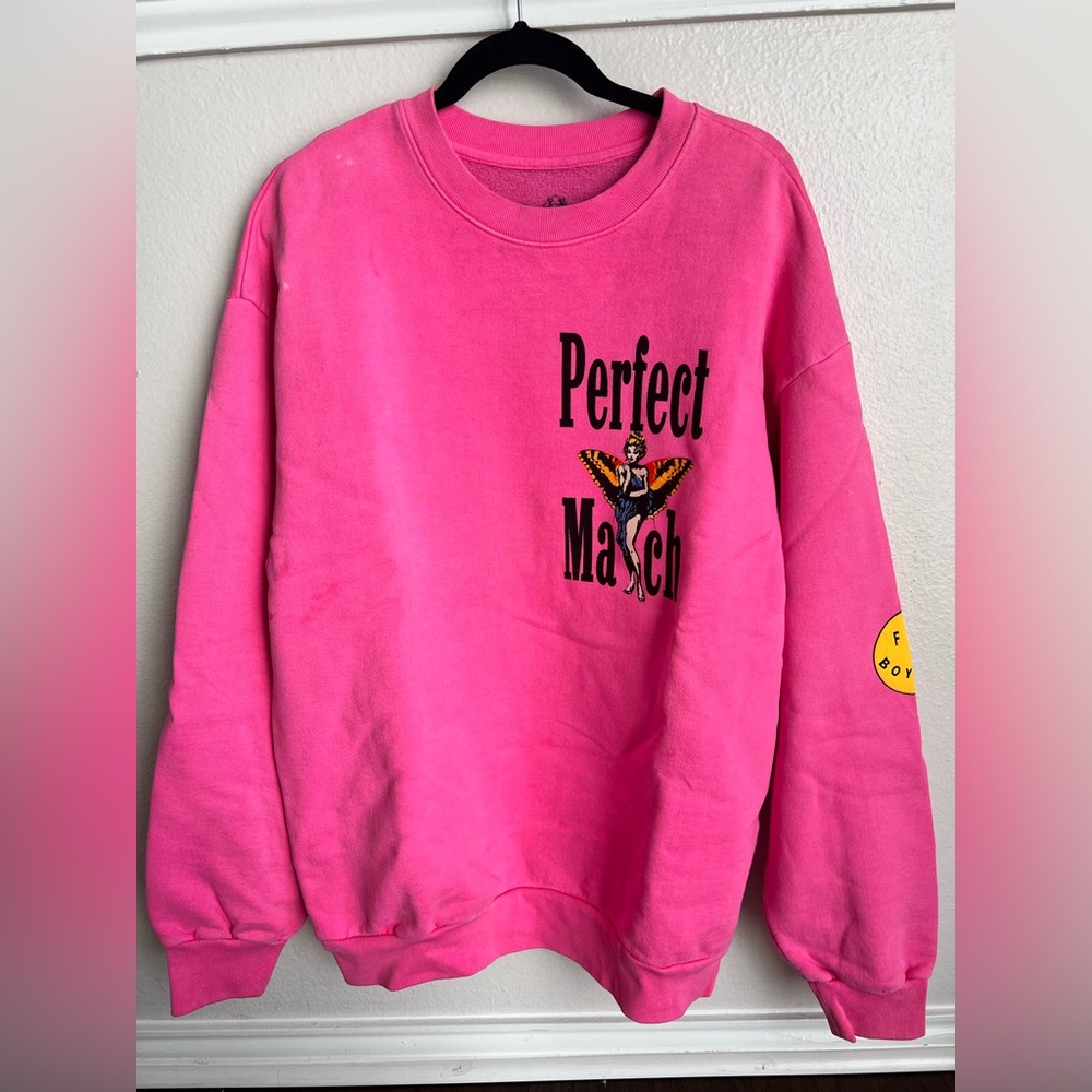 Hot pink oversized sweater. Brand name is Boys Lie